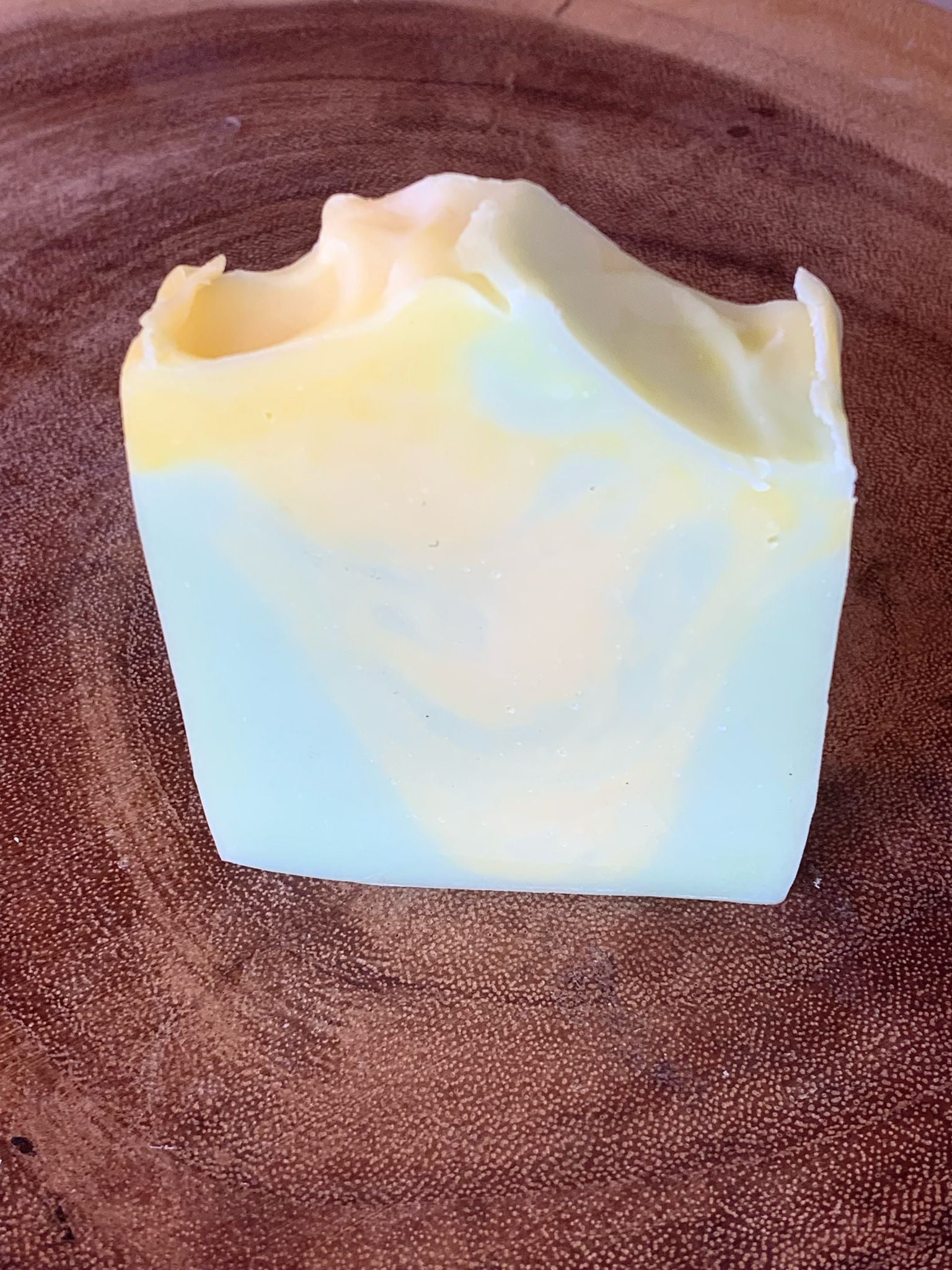A lemongrass and ginger scented soap with lime coloured swirls through it Handmade soap from Nurture soaps.
