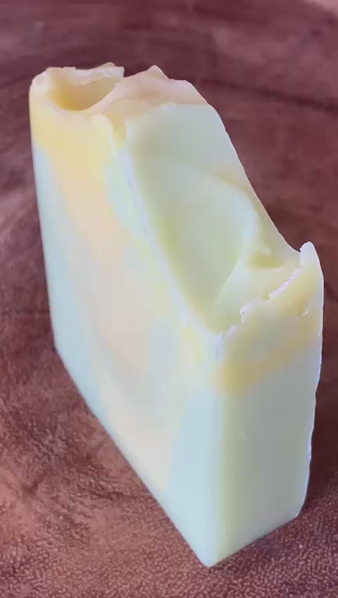 A video of nurture soas lively lemongrass soap, A lime coloured soap with lemongrass ans ginger scent.