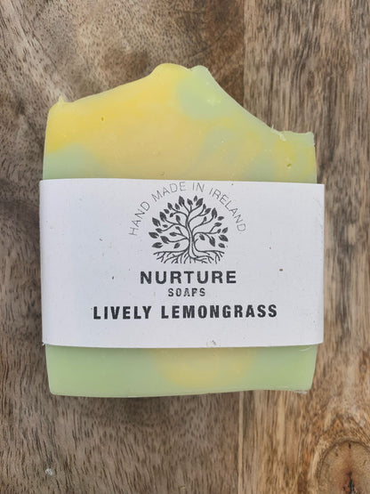 A soap bar with a yellow and green marbled design, labeled 'Lively Lemongrass' from Nurture Soaps.