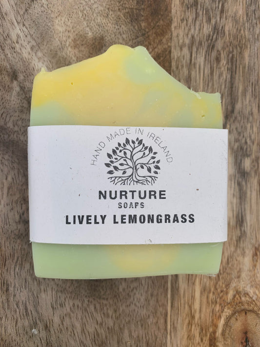 A soap bar with a yellow and green marbled design, labeled 'Lively Lemongrass' from Nurture Soaps.