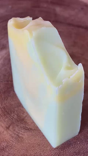 A video of nurture soas lively lemongrass soap, A lime coloured soap with lemongrass ans ginger scent.